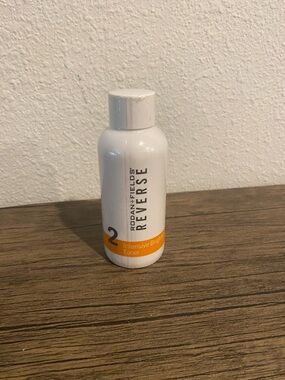Rodan + Fields White Bottle with Orange Accent Toner